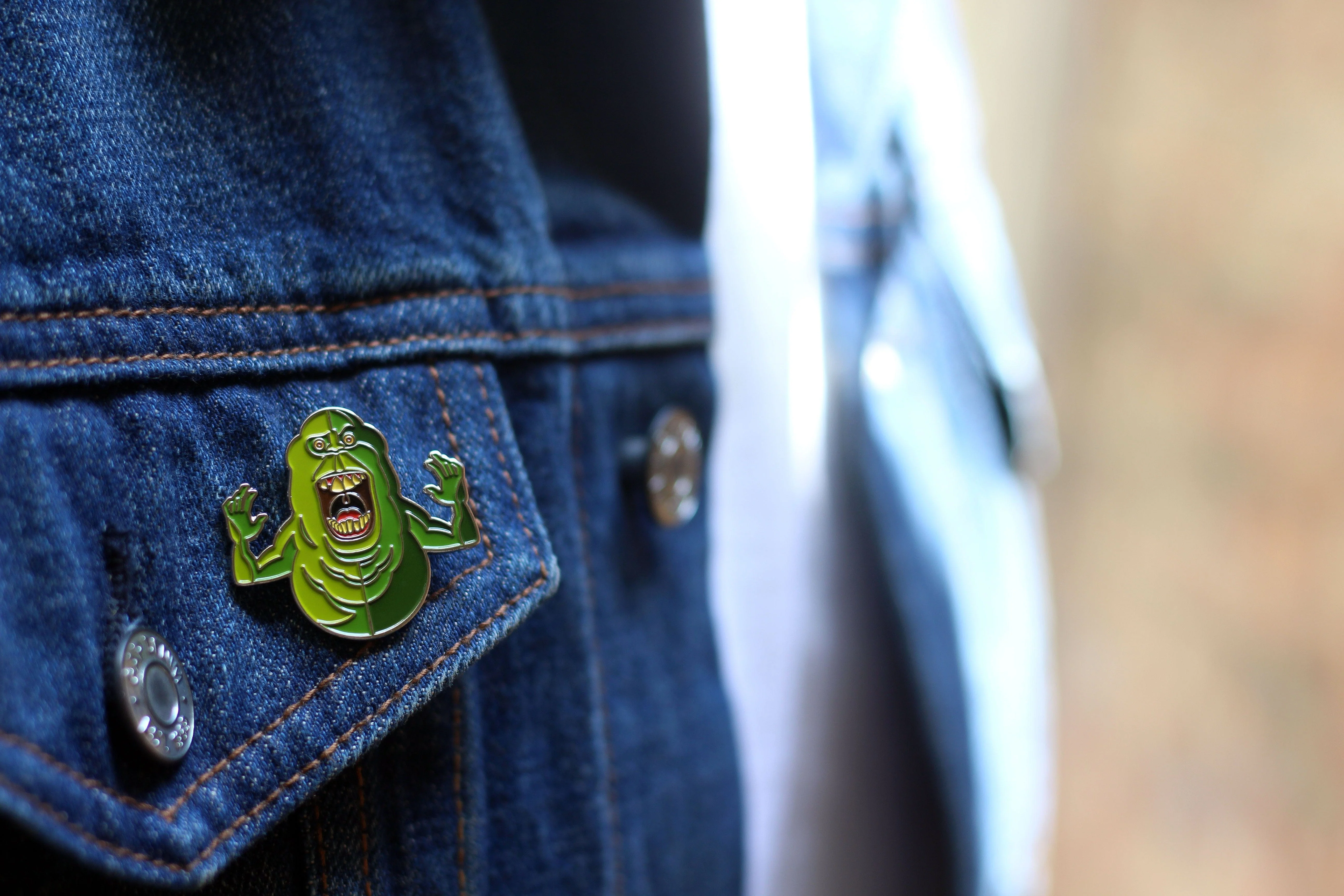 3745-ghostbusters-slimer-enamel-pin-3.webp Ghostbusters – Slimer Enamel Pin